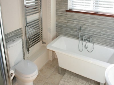 Modern downstairs bathroom at Glasfor holiday home in Anglesey